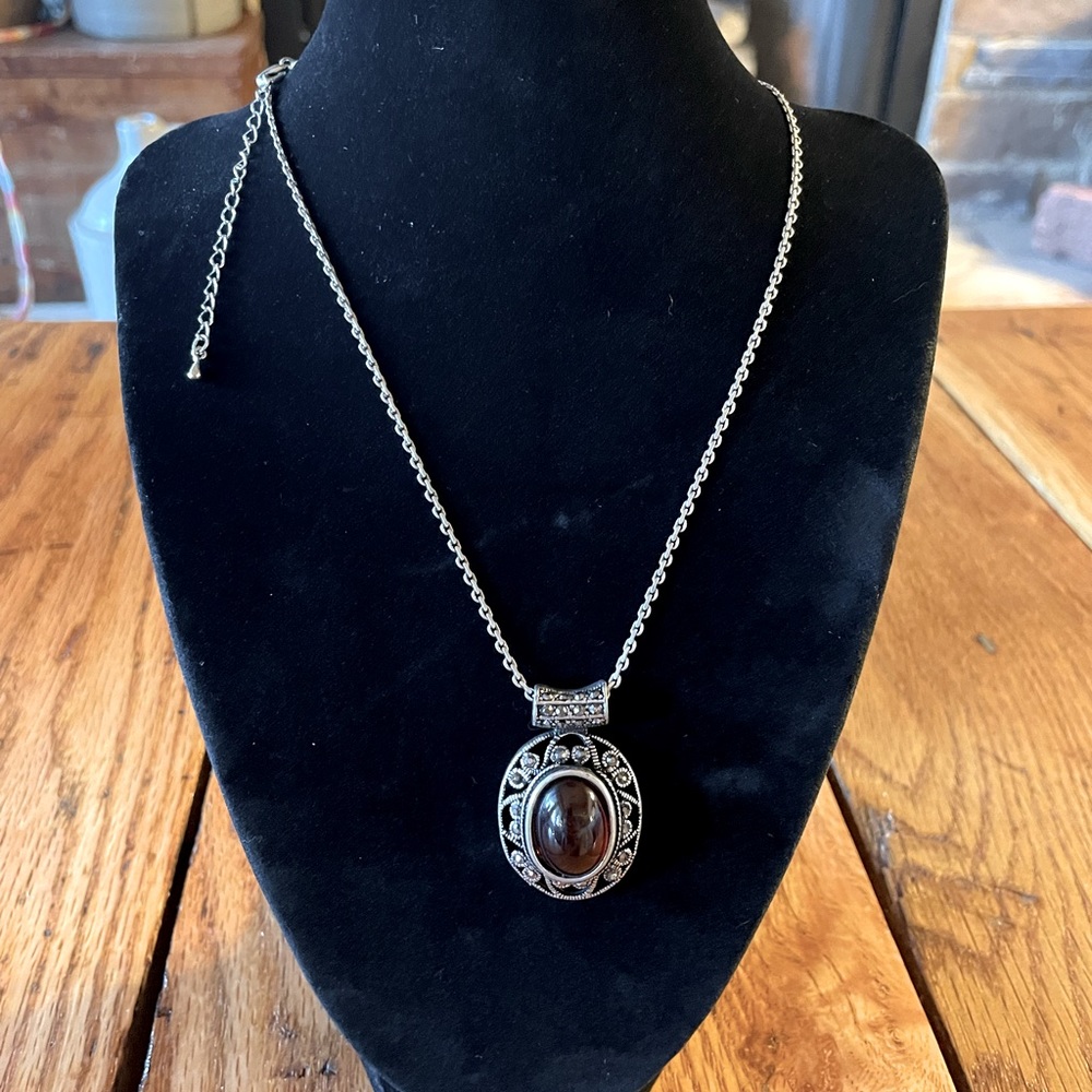 Silver necklace with marcasite and orange/brown stone pendant.  Great condition!